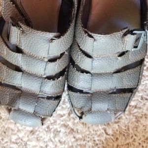 Men's brown sandals with memory foam sole.